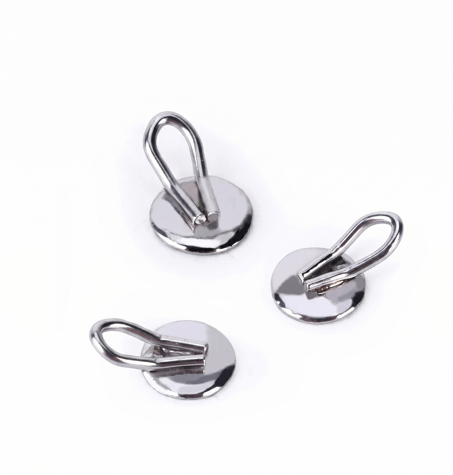 Three metallic hooks with loops on a white background