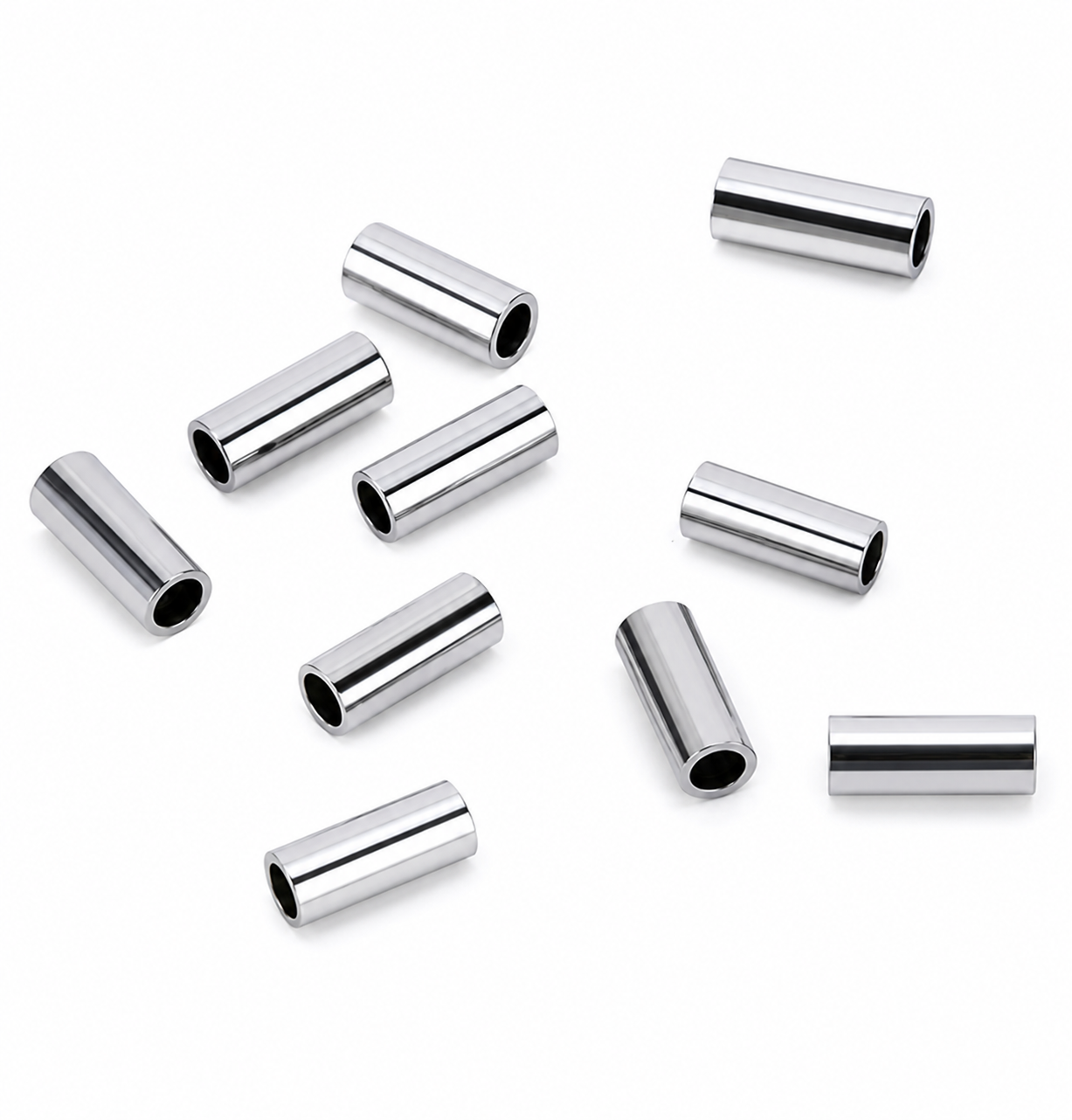 Silver cylindrical beads on a white background