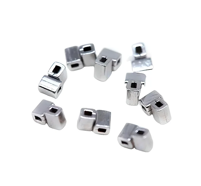 Silver Crimpable Cross Tube metal beads on a white background