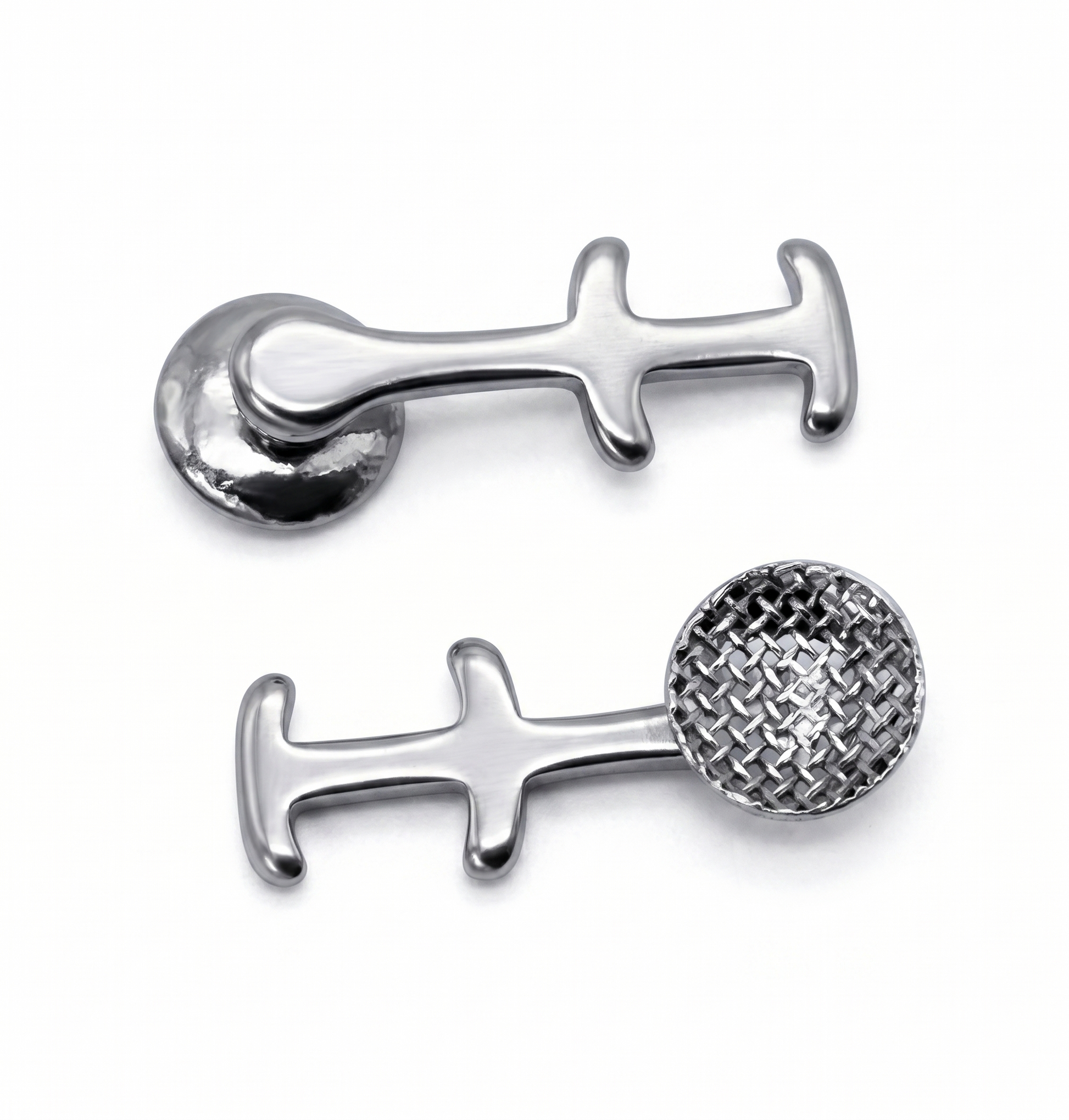 Silver double hool lingual buttonl on a white background