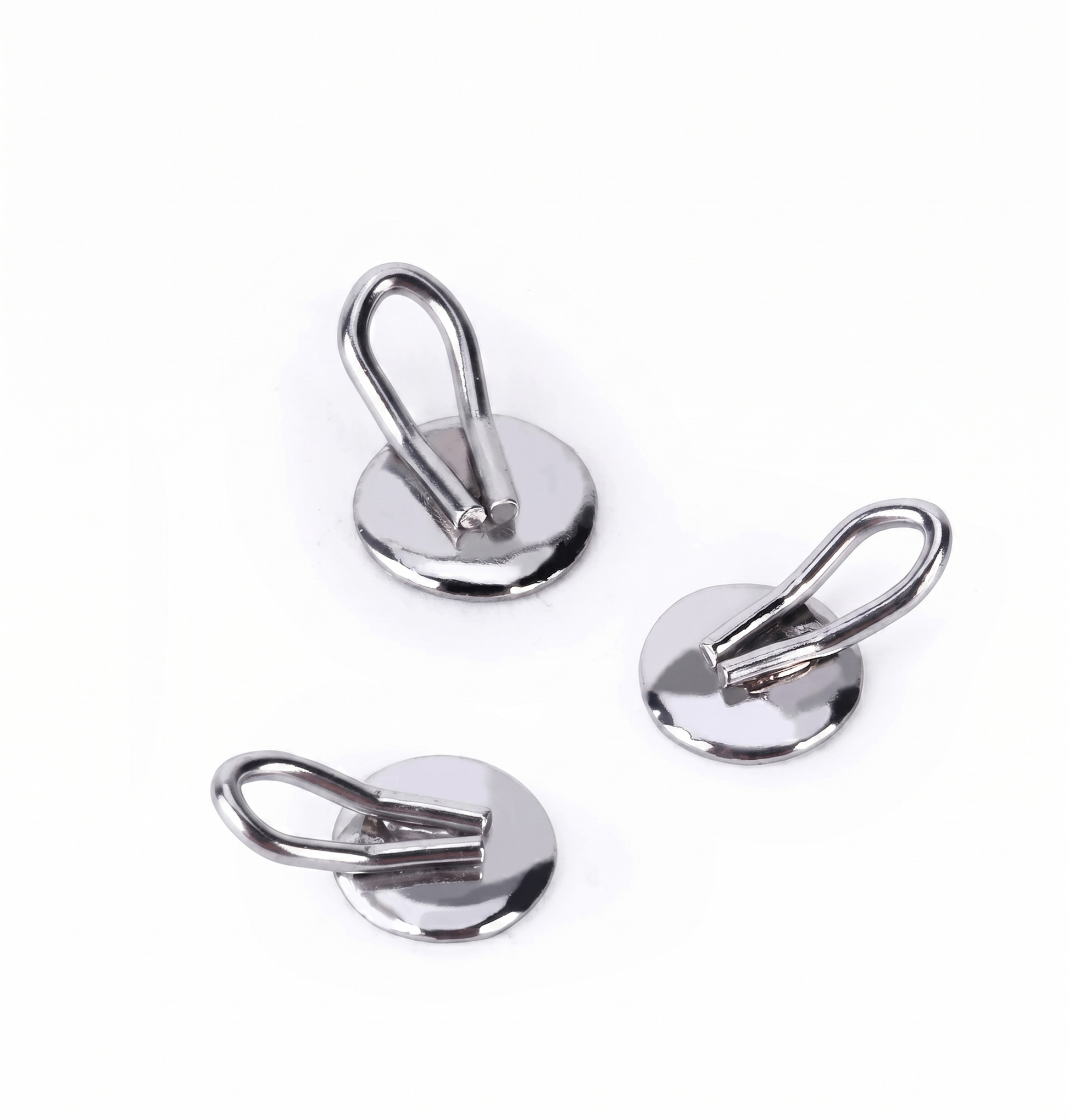 Three metallic hooks with loops on a white background
