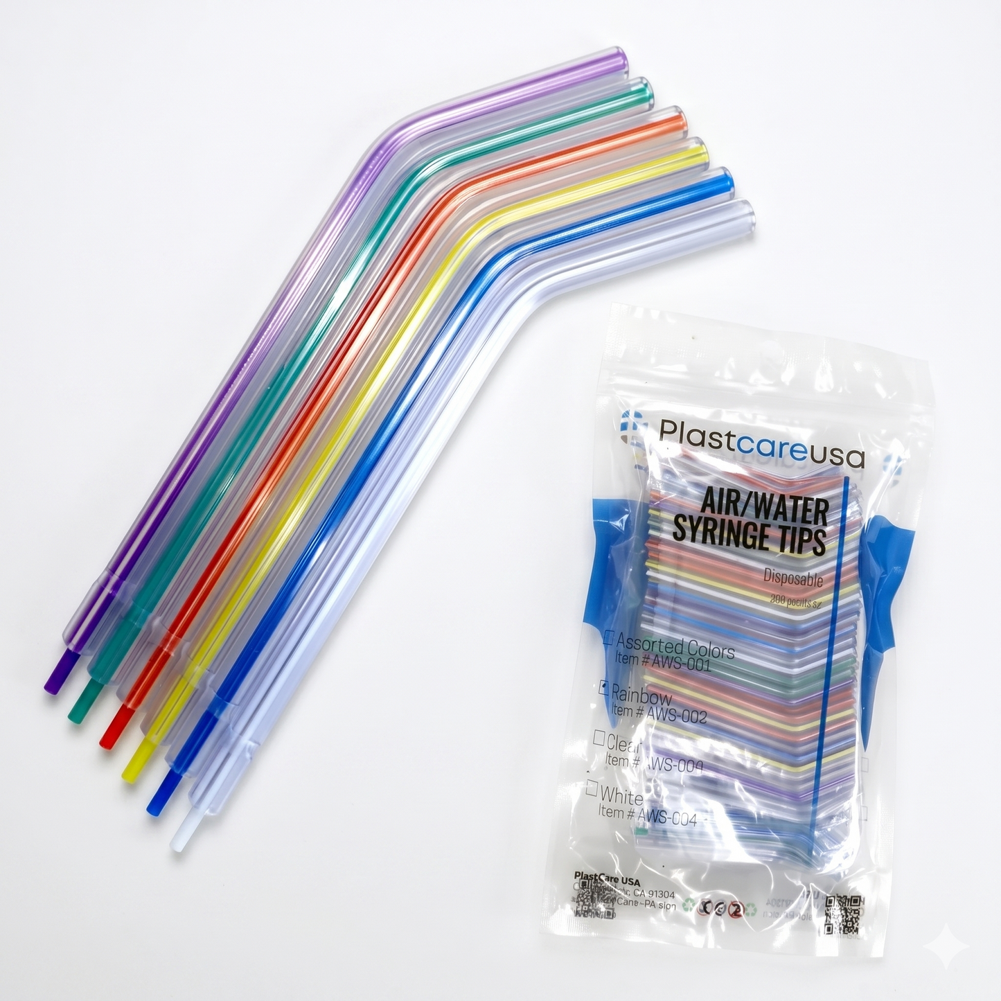 Colorful syringe tips with a package labeled 'PlastcareUSA' on a white background