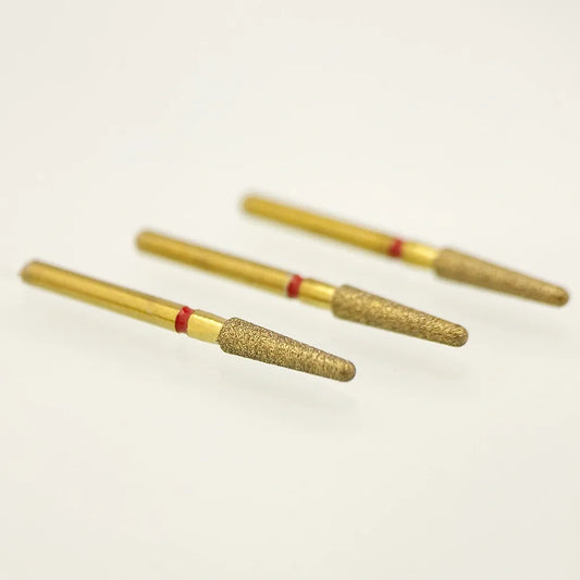 Three gold cylindrical objects with red bands on a white background
