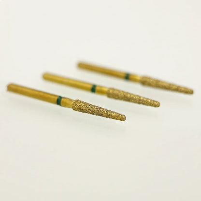 Three gold-colored cylindrical objects with green bands on a white background
